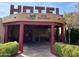 Hotel entrance with Gold Canyon logo, seating area, and desert landscaping at 6230 S Mesa Vista Dr, Gold Canyon, AZ 85118