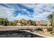 Neighborhood street view with mountain backdrop and desert landscaping at 6230 S Mesa Vista Dr, Gold Canyon, AZ 85118