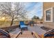 Relaxing outdoor patio with comfortable lounge chairs and scenic desert vistas at 6230 S Mesa Vista Dr, Gold Canyon, AZ 85118