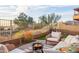 Cozy patio with comfortable seating and a warm fire pit, perfect for outdoor relaxation at 6230 S Mesa Vista Dr, Gold Canyon, AZ 85118