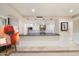 Modern kitchen with stainless steel appliances, breakfast bar seating, and granite countertops at 6803 E Main St # 2210, Scottsdale, AZ 85251