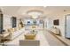 Elegant living room with modern decor, sleek furniture, and open-concept kitchen at 6803 E Main St # 2210, Scottsdale, AZ 85251