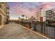 Spacious patio with decorative railing and sunset views, ideal for enjoying outdoor living at 6803 E Main St # 2210, Scottsdale, AZ 85251
