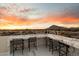 This scenic rooftop bar offers comfortable seating and sunset views at 6803 E Main St # 2210, Scottsdale, AZ 85251