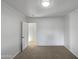 Neutral bedroom with carpet and an open doorway at 701 W Wilshire Dr, Phoenix, AZ 85007