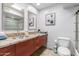 Bathroom featuring double sinks with granite counters and tiled floor at 7720 E Heatherbrae Ave # 13, Scottsdale, AZ 85251