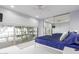 Tranquil bedroom features a large window with a view of the balcony and a mirrored closet at 7720 E Heatherbrae Ave # 13, Scottsdale, AZ 85251