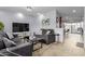 Comfortable living room with an adjacent dining area at 7720 E Heatherbrae Ave # 13, Scottsdale, AZ 85251