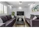 Bright living room featuring tile floors and a cozy seating arrangement at 7720 E Heatherbrae Ave # 13, Scottsdale, AZ 85251
