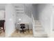 Inviting office space under the staircase with a contemporary desk and chair, offering a functional workspace at 7720 E Heatherbrae Ave # 13, Scottsdale, AZ 85251