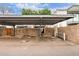 Carport with several assigned parking spots at 7720 E Heatherbrae Ave # 13, Scottsdale, AZ 85251