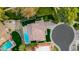 Overhead view of home with a beautiful backyard pool, and manicured lawn at 7721 N Via De La Montana --, Scottsdale, AZ 85258