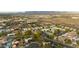 An aerial view of a community with lush landscaping, surrounded by mountains at 7721 N Via De La Montana --, Scottsdale, AZ 85258