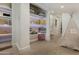 Finished basement with custom shelving, great for bonus storage or displaying your favorite decor pieces at 7721 N Via De La Montana --, Scottsdale, AZ 85258
