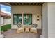 Inviting entryway with outdoor seating and a view into the home's interior at 7721 N Via De La Montana --, Scottsdale, AZ 85258