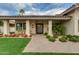 Charming front entrance highlighting beautiful landscaping and a welcoming walkway at 7721 N Via De La Montana --, Scottsdale, AZ 85258