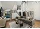 Spacious living room highlighting a cozy sectional sofa and a modern staircase at 7721 N Via De La Montana --, Scottsdale, AZ 85258