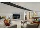 The living room is comfortable and open with a TV and an adjacent bonus storage area, complete with seating at 7721 N Via De La Montana --, Scottsdale, AZ 85258