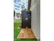 Modern outdoor shower featuring stylish black tiles, sleek fixtures, and a spacious wood plank floor at 7721 N Via De La Montana --, Scottsdale, AZ 85258