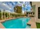 Serene backyard pool area with a shimmering blue pool and lush landscaping at 7721 N Via De La Montana --, Scottsdale, AZ 85258
