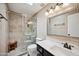 Updated bathroom with a tiled shower featuring a glass door and modern vanity at 9021 E Palmer Dr, Sun Lakes, AZ 85248