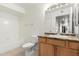Bright bathroom with tiled shower and vanity at 9990 N Scottsdale Rd # 2049, Paradise Valley, AZ 85253
