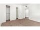 Bedroom with sliding closet doors and bright natural lighting at 9990 N Scottsdale Rd # 2049, Paradise Valley, AZ 85253