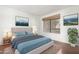Cozy bedroom featuring a comfortable bed, bright window and decor at 9990 N Scottsdale Rd # 2049, Paradise Valley, AZ 85253
