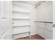 Organized closet with shelving and rods for storage at 9990 N Scottsdale Rd # 2049, Paradise Valley, AZ 85253