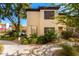 Charming condo with beautiful landscaping and a lovely walkway leading to the entrance at 9990 N Scottsdale Rd # 2049, Paradise Valley, AZ 85253