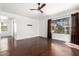 Spacious living room features modern ceiling fan and natural light at 9990 N Scottsdale Rd # 2049, Paradise Valley, AZ 85253