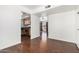 Bright living room featuring hardwood floors and an open layout to the kitchen at 9990 N Scottsdale Rd # 2049, Paradise Valley, AZ 85253