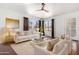 Comfortable living room featuring bright walls, hardwood floors, and ample natural light at 9990 N Scottsdale Rd # 2049, Paradise Valley, AZ 85253