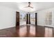 Bright living room features wood floors, neutral walls, and large windows at 9990 N Scottsdale Rd # 2049, Paradise Valley, AZ 85253