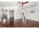 Open floor plan featuring hardwood floors, bright walls, and a ceiling fan at 9990 N Scottsdale Rd # 2049, Paradise Valley, AZ 85253