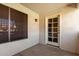 Private patio offering a serene setting with access to a door, great for relaxation at 9990 N Scottsdale Rd # 2049, Paradise Valley, AZ 85253