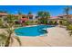 Community pool featuring lounge seating and lush landscaping at 9990 N Scottsdale Rd # 2049, Paradise Valley, AZ 85253