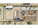 An aerial view showcases the roof with solar panels and the property size at 10203 N Burris Rd, Casa Grande, AZ 85122