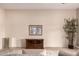 Living room featuring tile floors, a decorative cabinet, and a potted plant at 10203 N Burris Rd, Casa Grande, AZ 85122