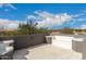 This roof top patio offers views of the surrounding desert landscape with built in seating at 10203 N Burris Rd, Casa Grande, AZ 85122