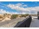 This roof top patio features a decorative roof and a view of the back yard and neighborhood at 10203 N Burris Rd, Casa Grande, AZ 85122