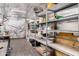 Unfinished storage room insulated with shelving at 10203 N Burris Rd, Casa Grande, AZ 85122