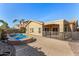 Spacious backyard with private pool, spa, covered patio, and desert landscaping at 10339 E Juanita Ave, Mesa, AZ 85209