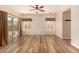 Bright bedroom featuring tiled floors and sliding glass door to the backyard at 10339 E Juanita Ave, Mesa, AZ 85209