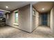 Welcoming covered front porch with stone pavers, offering a view of the home's entrance and windows at 10702 E Sheffield Dr, Mesa, AZ 85212