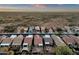 Aerial view of desert homes, landscaping, with desert views in a quiet residential neighborhood at 10758 E Peralta Canyon Dr, Gold Canyon, AZ 85118