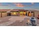 Paver patio with desert landscaping and block fence off the exterior of the home at 10758 E Peralta Canyon Dr, Gold Canyon, AZ 85118