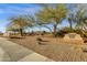 Community Desert Glory Pool sign with Desert landscaping and sidewalk at 10758 E Peralta Canyon Dr, Gold Canyon, AZ 85118