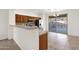 View of the kitchen with stainless steel appliances and access to the backyard patio at 10758 E Peralta Canyon Dr, Gold Canyon, AZ 85118