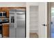 Kitchen with stainless steel refrigerator and walk in pantry at 10758 E Peralta Canyon Dr, Gold Canyon, AZ 85118